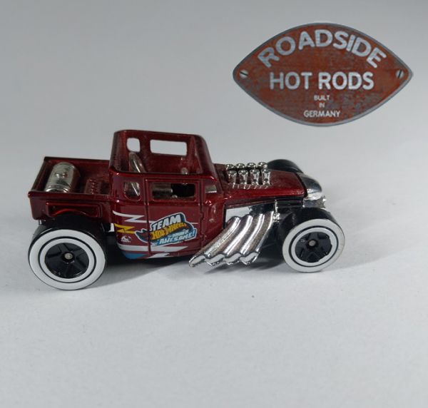 Hot Wheels Model-Auto 1:64 Bone Shaker Dkl. Rot Team Hot Wheels The Origin of Awesome ​60250-3-5 *